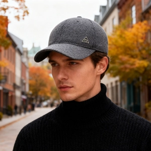 Winter thermal baseball cap with ear protection and ProHike logo on a male model