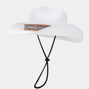 Detail view of white straw cowboy hat with ethnic embroidered band and wind rope