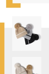 Detailed knit texture and fluffy faux fur pompom on thick winter beanies for women