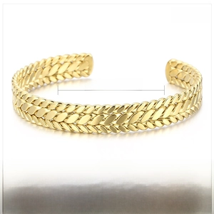 Detail view of 9mm stainless steel wheat pattern cuff bangle showing 60x9mm dimensions