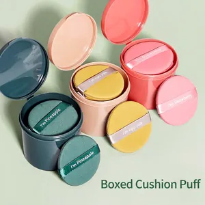 Three sets of non-latex cushion puffs with matching storage cases in multiple colors