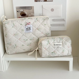 Quilted floral makeup bag set with ribbon bow pattern and ivory cotton fabric