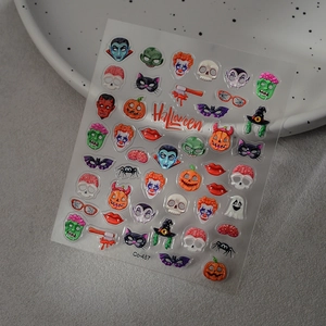 Autocollants 3D pour ongles Halloween avec citrouilles et crânes sur plat blanc
