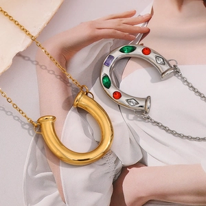 Gold and silver horseshoe pendant necklaces with colorful rhinestones on 316L steel chains