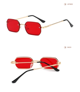 Detail view of red lens retro metal sunglasses showing 45-degree side and folded back angles