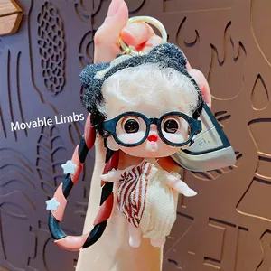 Cute cartoon doll keychain with movable limbs and striped dress for bag decoration