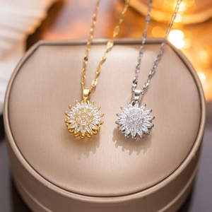 Luxury rotating sunflower and four-leaf clover necklaces in gold and silver finish