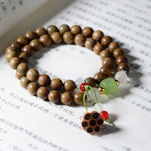 Argentine Green Sandalwood double-wrap bracelet with wooden beads and lotus pod pendant