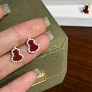 Elegant gold-plated red gourd stud earrings with zircon inlay for a classic chic look