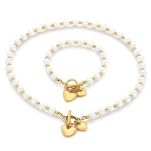 Golden heart pendant necklace and bracelet set with white pearls and OT toggle clasp