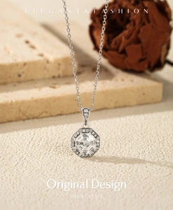 Detail of S925 silver necklace featuring an octagonal cut crystal pendant in a macro view