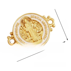 Macro detail of gold-plated St. Benedict medal connector with size specs for DIY jewelry