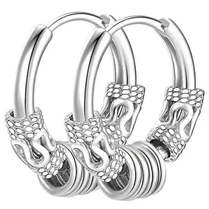 Detailed view of silver dragon engraved huggie hoop earrings with multi-ring charms
