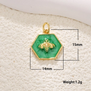 Detail showing gold bee charm dimensions of 15mm by 14mm with green enamel inlay