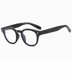 Detailed side view of classic black sunglasses featuring silver double dot rivets and wide temples