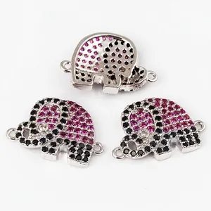 Three gold-plated elephant connectors with purple and black cubic zirconia for DIY jewelry