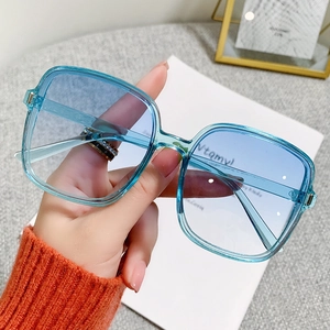 Chic oversized square sunglasses with blue gradient lenses and transparent frame