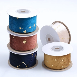 Golden star pattern velvet ribbons in multiple colors on a clean white background