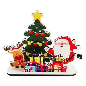 Wooden Christmas table decor with Santa Claus, reindeer, and tree on a white base
