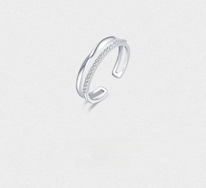 Close-up of S925 sterling silver double-layer ring featuring a cubic zirconia pavé band