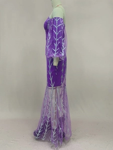 Detail of purple mesh fishtail gown with sparkling silver branch patterns and sheer sleeves