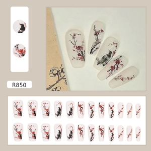Press-on nails set featuring Chinese ink style red plum and magpie on matte white base