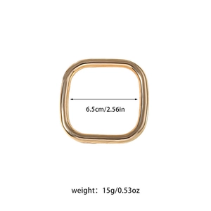Detail showing 6.5cm diameter and 15g weight of the gold CCB bangle on white background