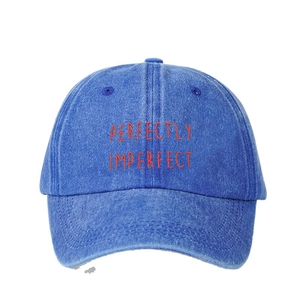 Vintage navy blue washed cotton baseball cap with orange Perfectly Imperfect embroidery