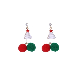 Detail of Christmas earrings featuring white enamel trees and festive red green pom-poms