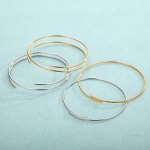 Minimalist gold and silver open bangle bracelets in polished stainless steel for women
