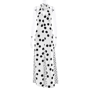 Sleeveless polka dot halter maxi dress with backless design and light flowing fabric