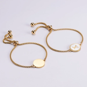 Adjustable 18k gold plated bracelet with shell inlay and custom letter X round charm