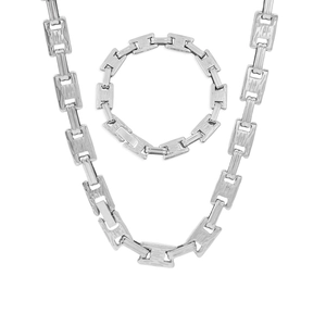 Detailed view of silver titanium steel necklace and bracelet set with thick square chain links