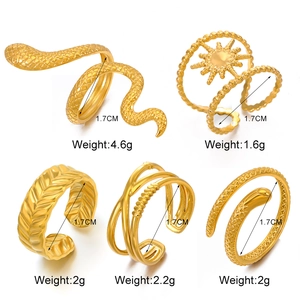 Detail of five gold snake and sun rings with 1.7cm inner diameter and 1.6g-4.6g weight