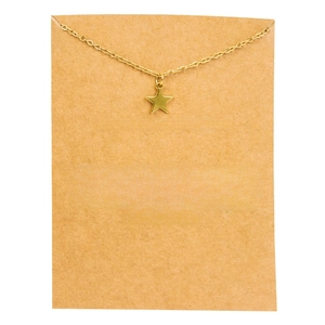 Collier avec pendentif étoile dorée et chaîne fine sur carte cadeau Rising Star brune