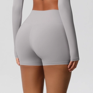 Rear view of light gray high-waisted seamless yoga shorts with butt-lifting effect