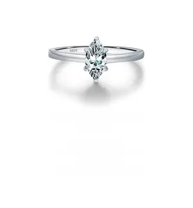 Macro shot of S925 sterling silver stamp on marquise cut moissanite ring band