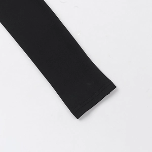 Detail of double-needle stitching on the black knitted sleeve cuff with clean seams