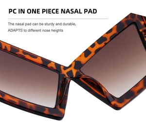 Detailed macro view of the integrated PC nasal pad on tortoiseshell cat eye sunglasses
