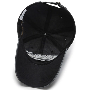 Internal view of a washed dark grey 100% cotton baseball cap with adjustable strap
