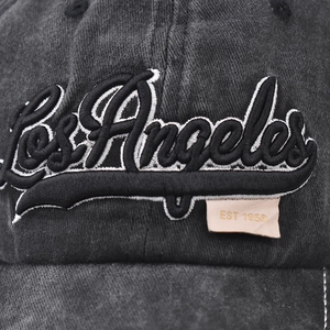 Dark gray washed cotton baseball cap featuring Los Angeles embroidery and EST 1958 tag