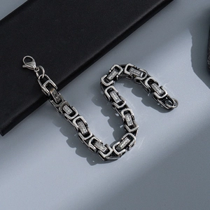 Close-up of Byzantine hip-hop bracelet with polished textures and lobster clasp