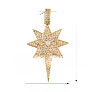 Detailed view of gold star pendant with dimensions 35x25mm and zircon inlay