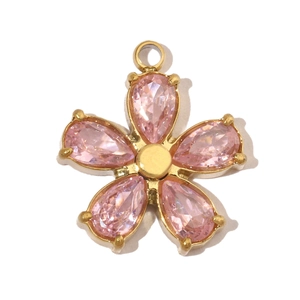 Detailed view of pink zircon flower pendant with golden plating and sparkling facets