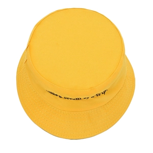 Bright yellow cotton bucket hat featuring black cursive embroidery on a plain white background