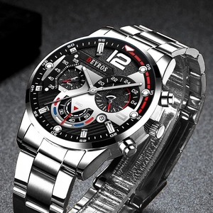 Detailed close-up of a silver stainless steel watch with a black multi-functional dial