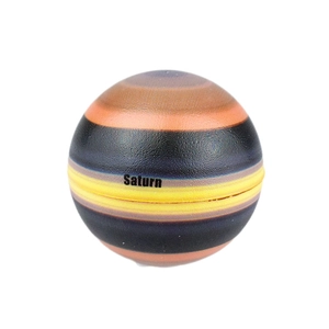 Macro shot of Saturn planet toy ball made of soft PU foam with realistic surface texture