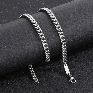 Polished silver stainless steel Cuban link bracelet with engravable rectangular tag