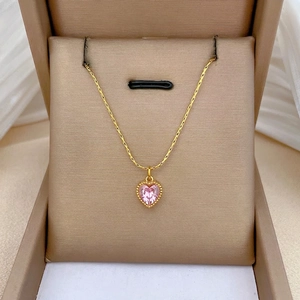 Golden heart necklace with pink stone pendant presented in a premium gift box