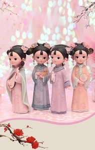 Detailed view of four resin palace girl figurines in traditional Qing dynasty costumes